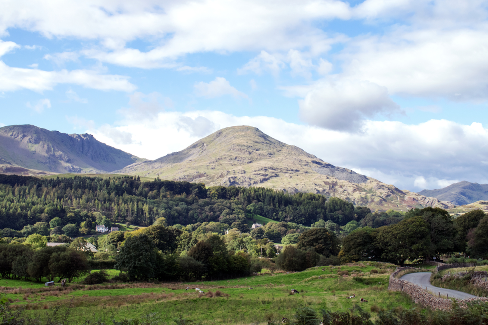 An image depicting the trail Old Man of Coniston and its surrounding area.