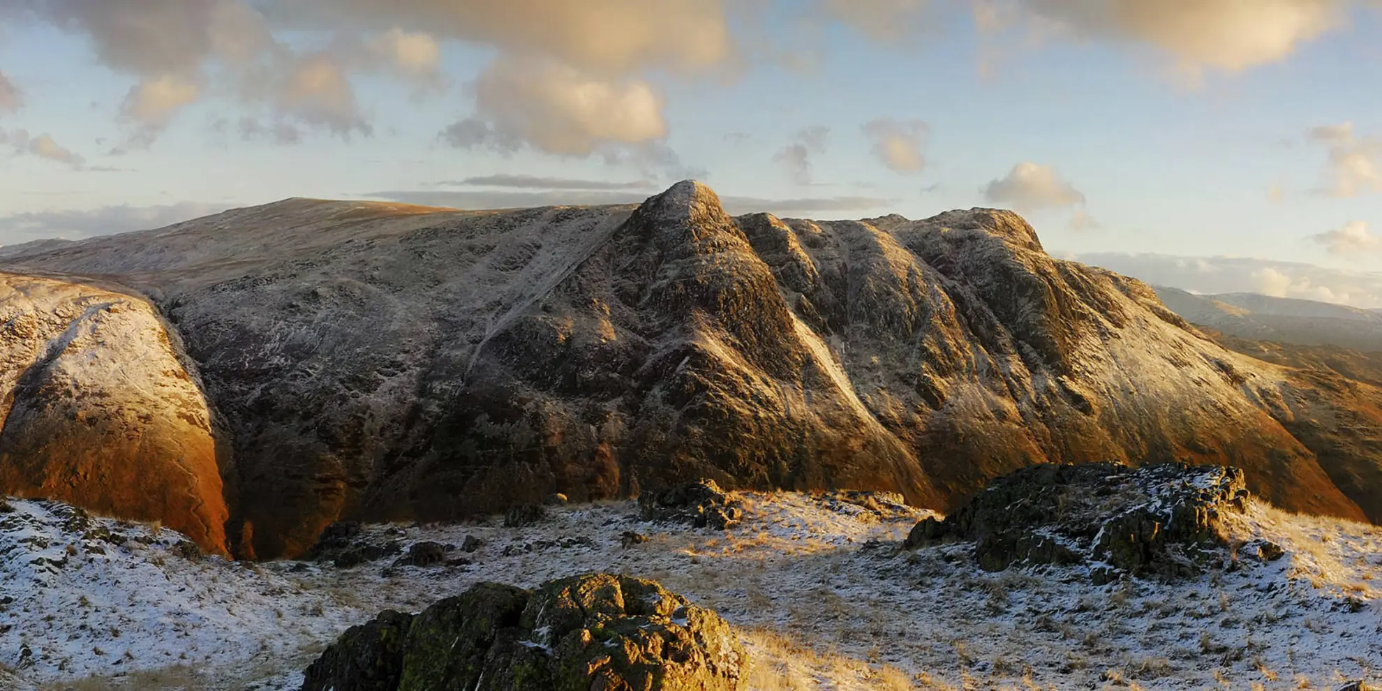 An image depicting the trail Pavey Park and Stickle Tarn Loop via Harrison Stickle and its surrounding area.