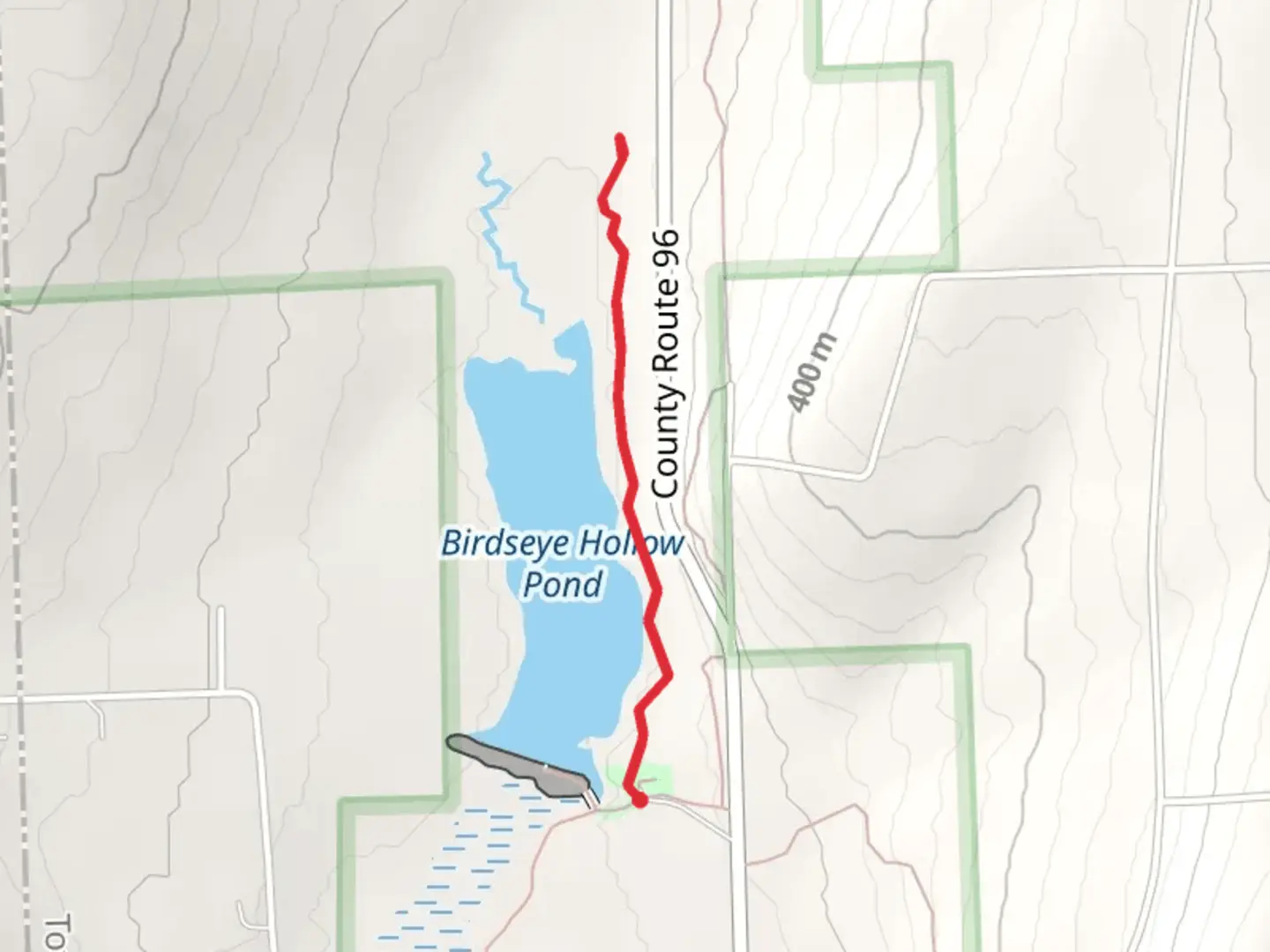 An image depicting the trail Birdseye Hollow Park and its surrounding area.