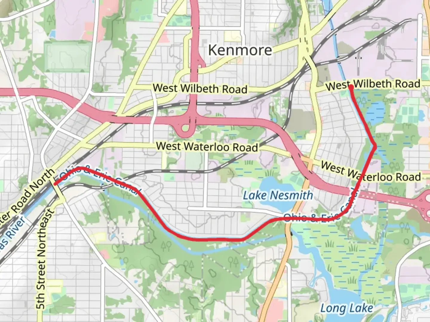 An image depicting the trail Ohio and Erie Canal Towpath Trail from West Wilbeth Road and its surrounding area.