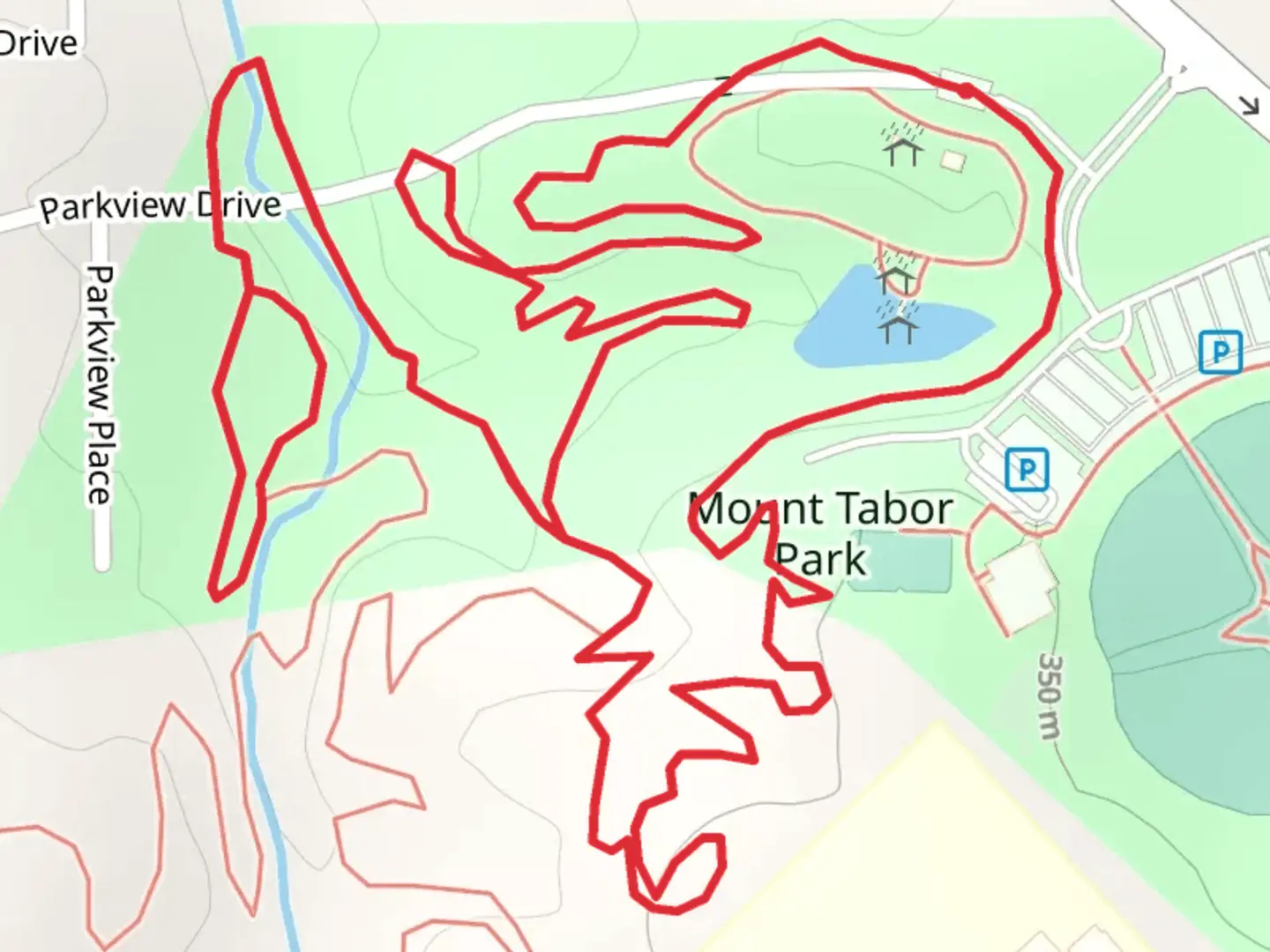 An image depicting the trail Mount Tabor Park Walking Trail and its surrounding area.