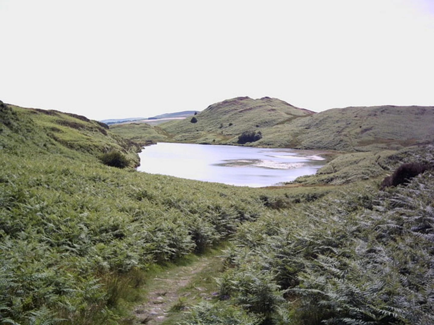 An image depicting the trail Broughton in Furness to Coniston Walk via Beacon Tarn and its surrounding area.