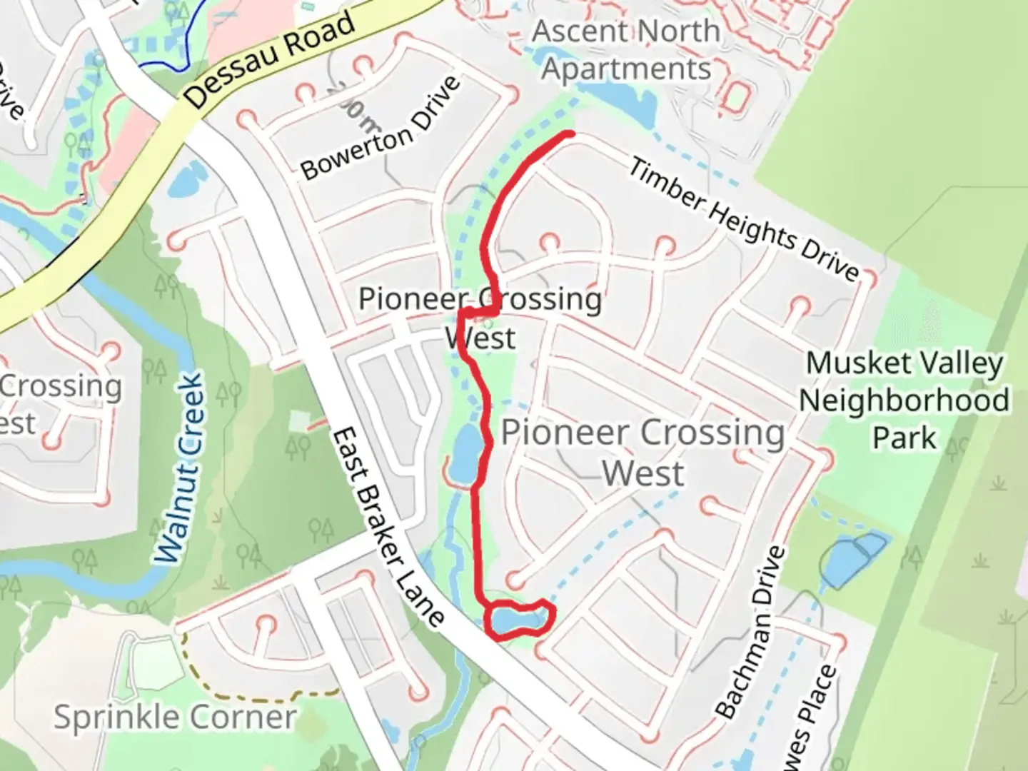 An image depicting the trail Pioneer Crossing West Greenbelt and its surrounding area.