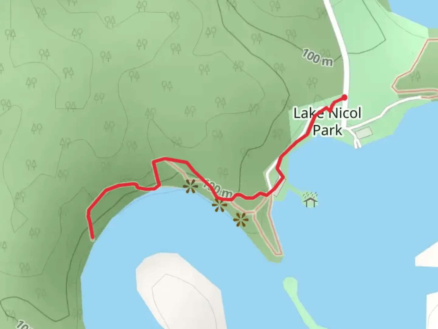 An image depicting the trail Lake Nicol Park and its surrounding area.