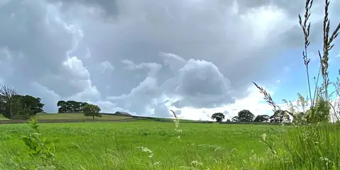An image depicting the trail Keighley Moor Reservoir and Hitching Stone from Cowling and its surrounding area.