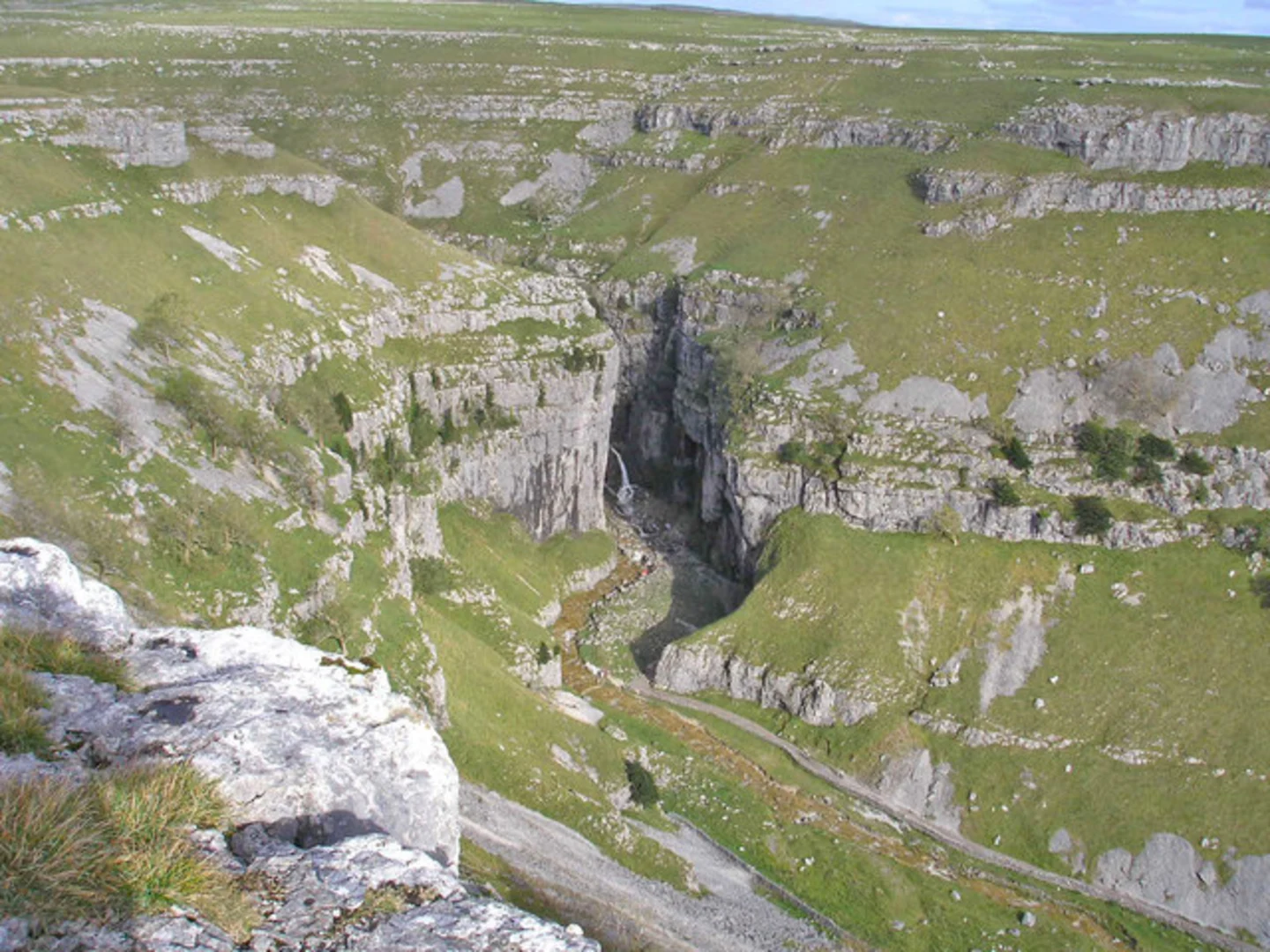 An image depicting the trail Little Gordale Wood via Riverside Path and its surrounding area.