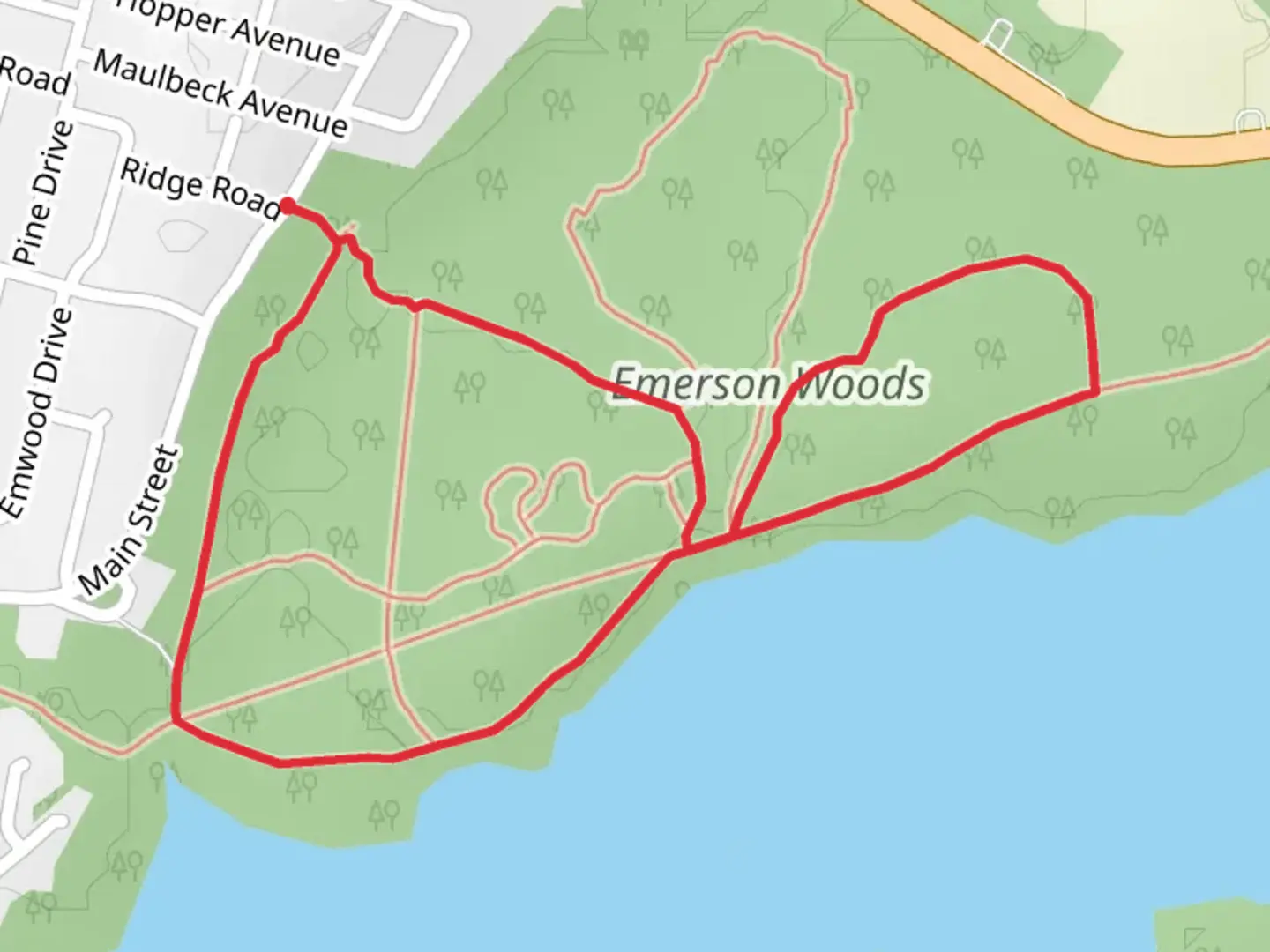 An image depicting the trail Loop along Oradell Reservoir - Emerson Woods and its surrounding area.