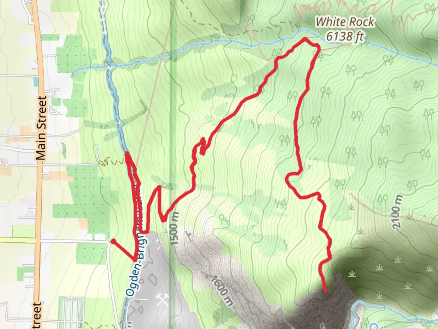 An image depicting the trail Ogden Brigham Canal Walk and its surrounding area.