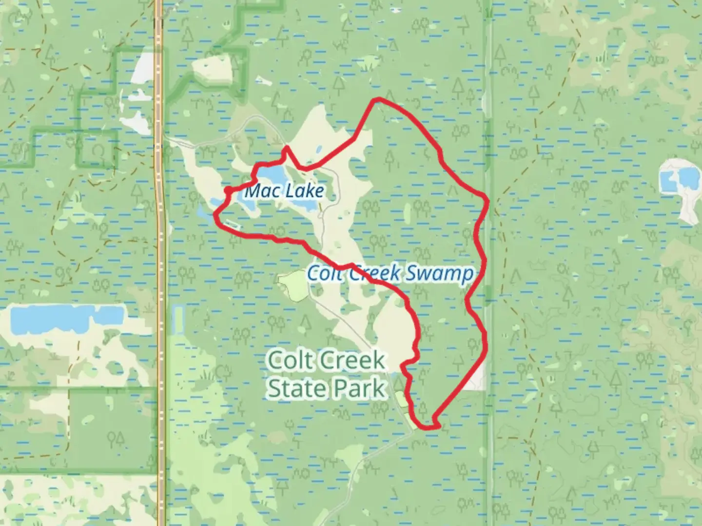 An image depicting the trail Flatwoods -Orange Loop Trail and its surrounding area.