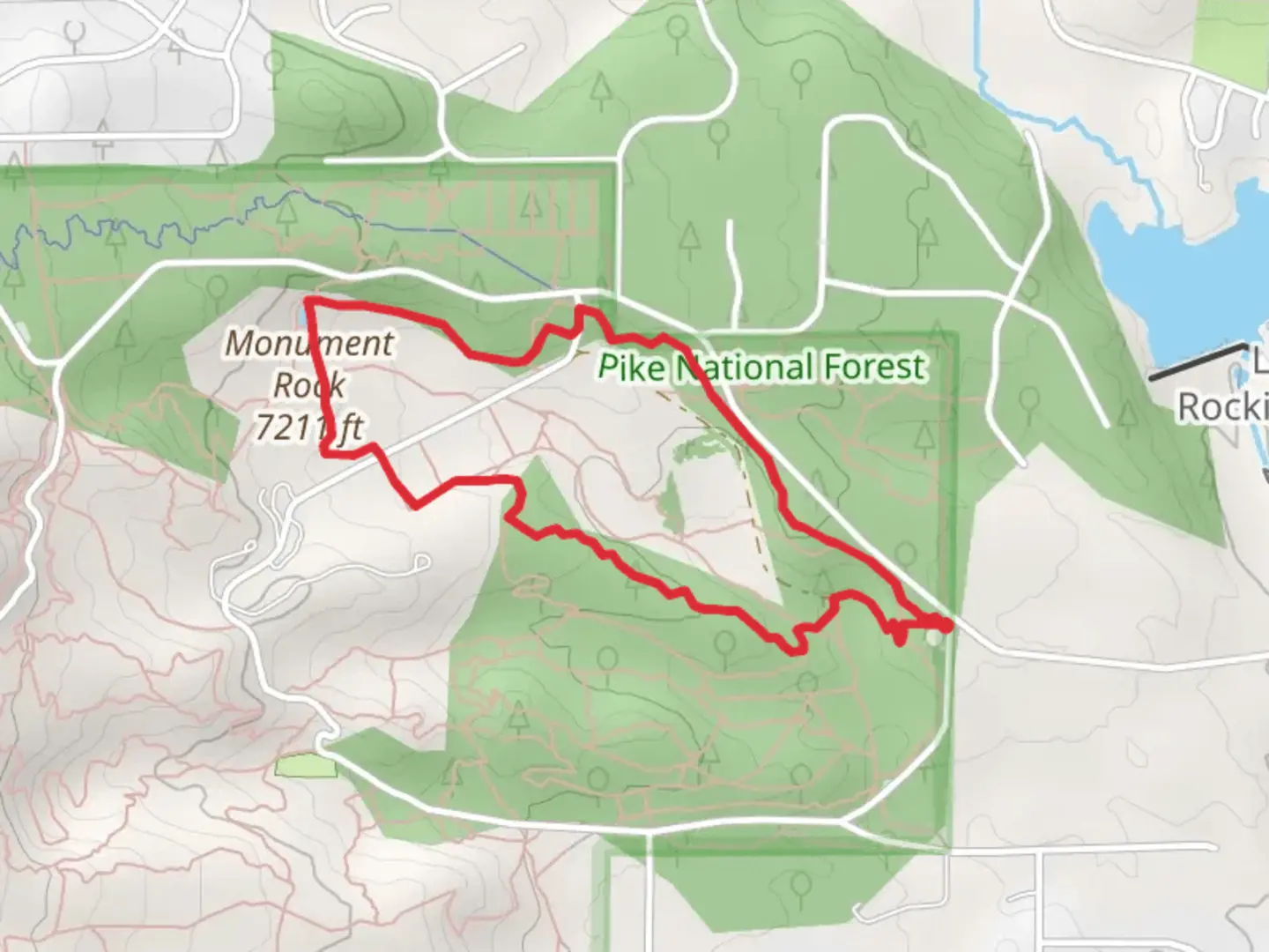 An image depicting the trail Monument Rock Loop via Monument Fire Center Trail and its surrounding area.