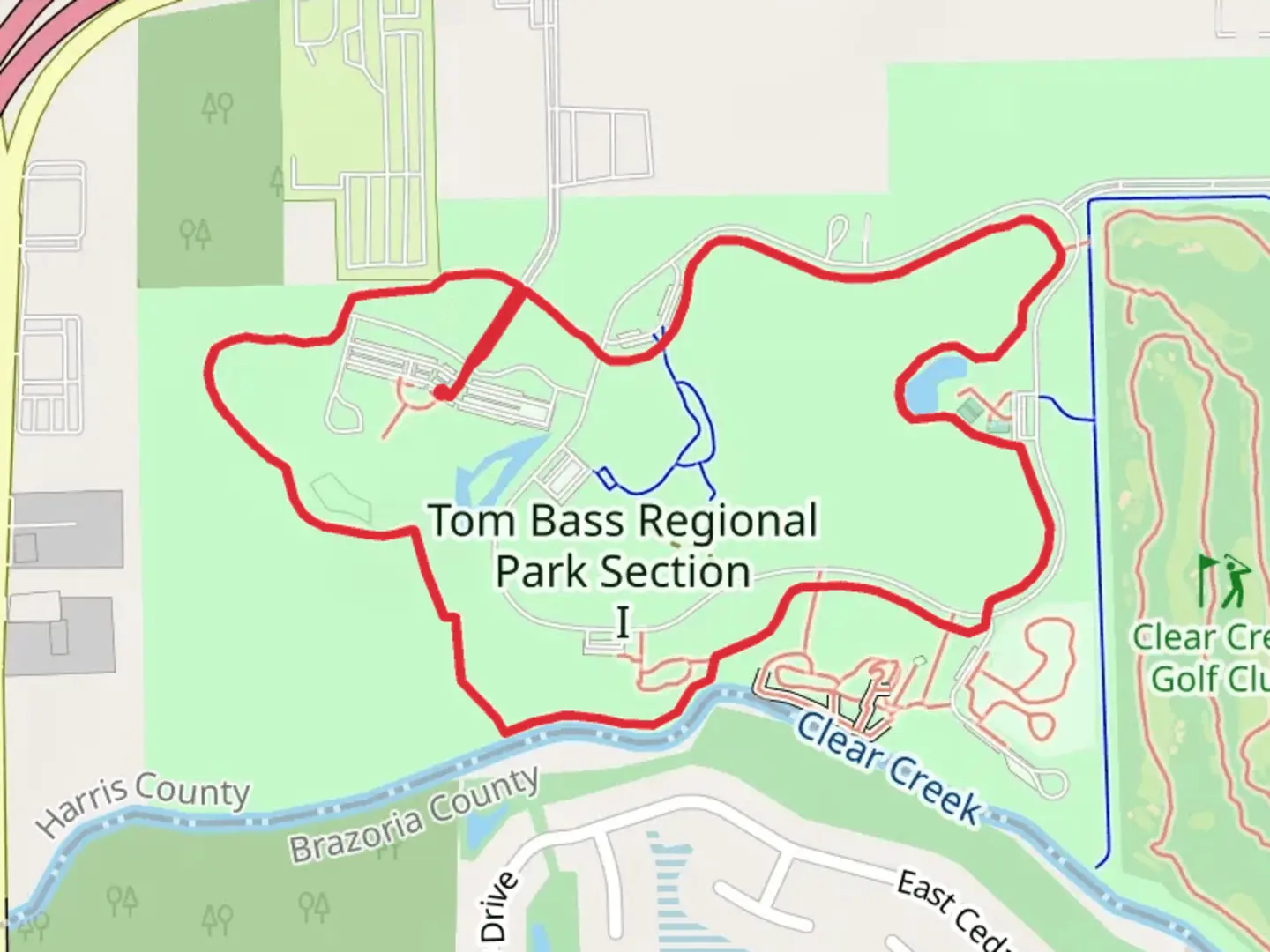 An image depicting the trail Tom Bass Regional Park Section I and its surrounding area.