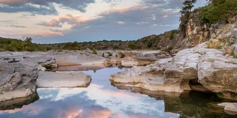 An image depicting the trail Pedernales State Park Loop and its surrounding area.