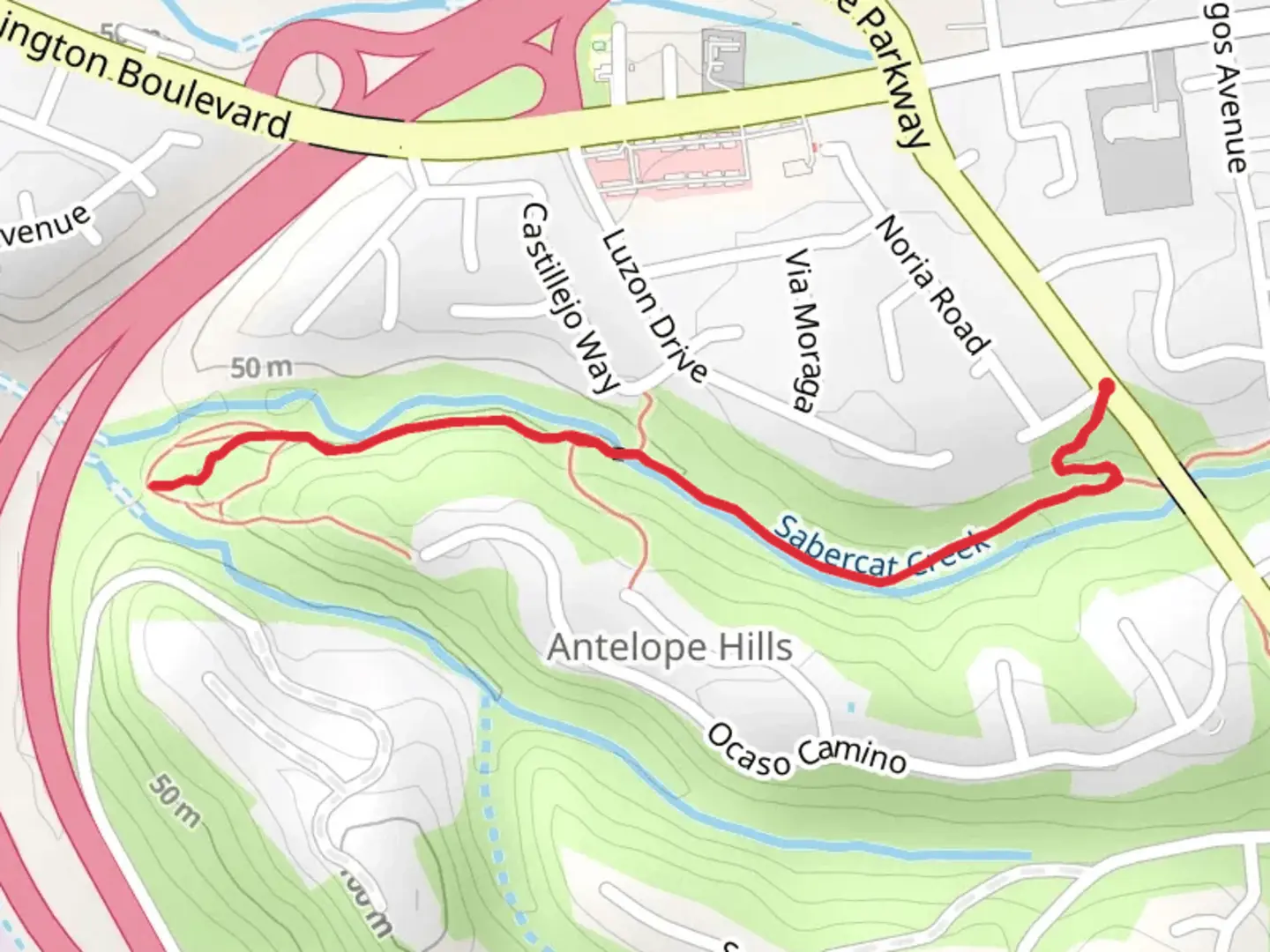 An image depicting the trail Sabercat Creek Trail and its surrounding area.