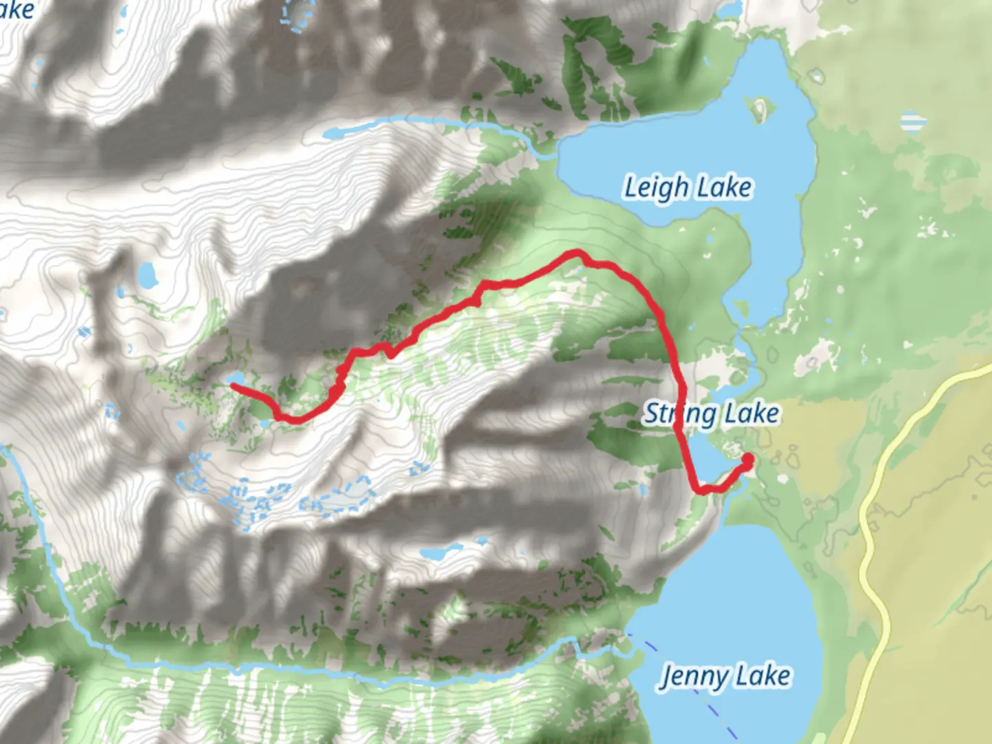 An image depicting the trail Holly Lake via String Lake Trail and its surrounding area.