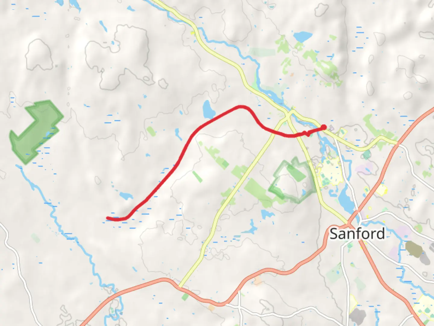 An image depicting the trail Deering Pond via Sanford Springvale Rail Trail and its surrounding area.