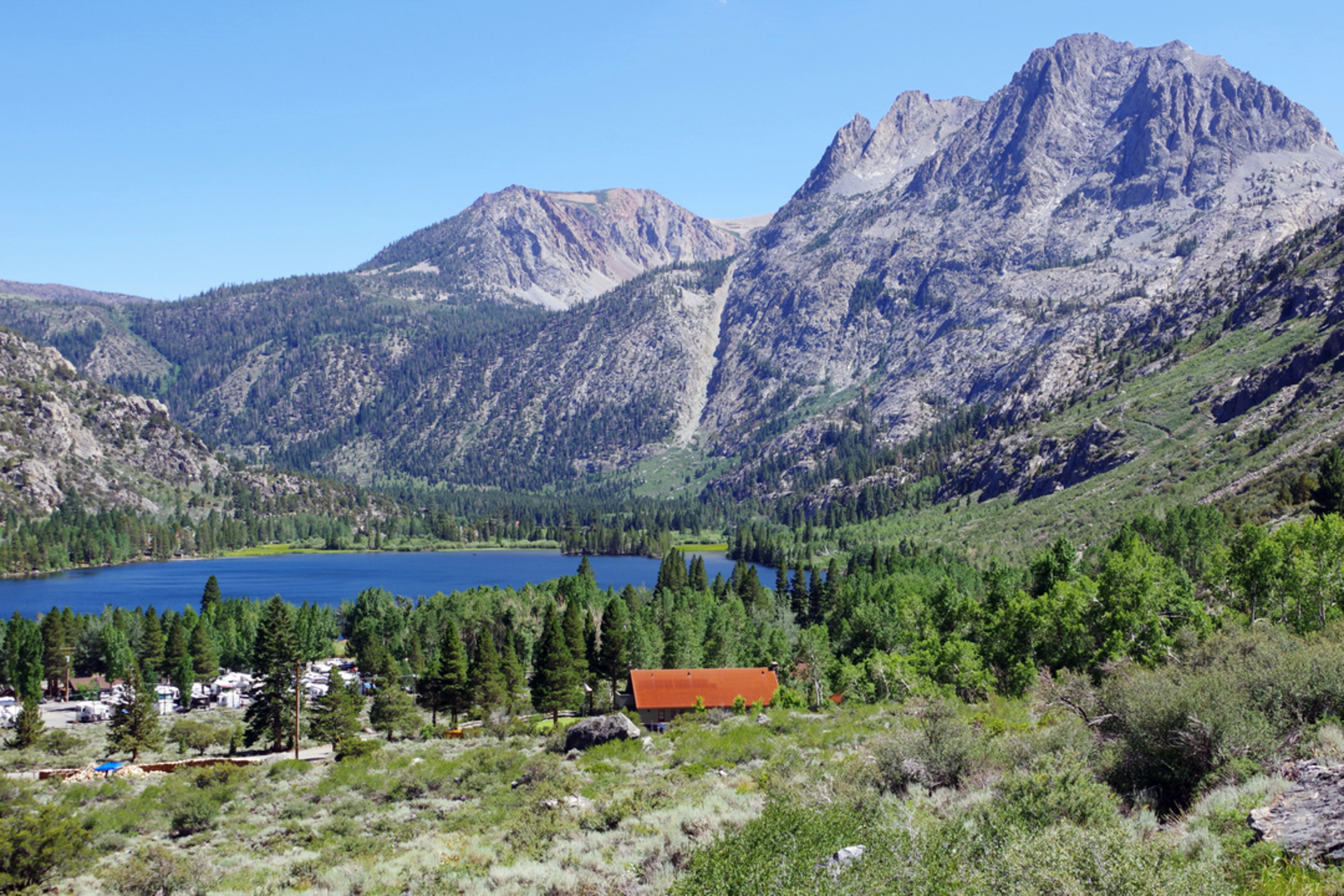 An image depicting the trail Fern Lake via Yost Creek Trail and its surrounding area.