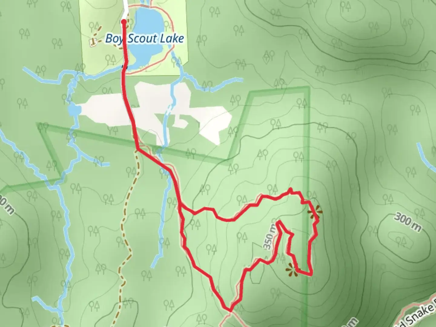 An image depicting the trail Wyanokie Crest Loop Trail from Boy Scout Lake and its surrounding area.