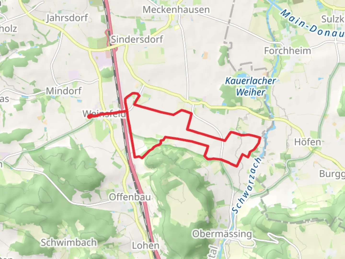 An image depicting the trail Weinsfeld Panoramaweg and its surrounding area.
