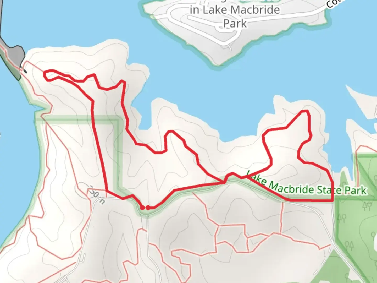 An image depicting the trail Lake MacBride Overlook Loop and its surrounding area.