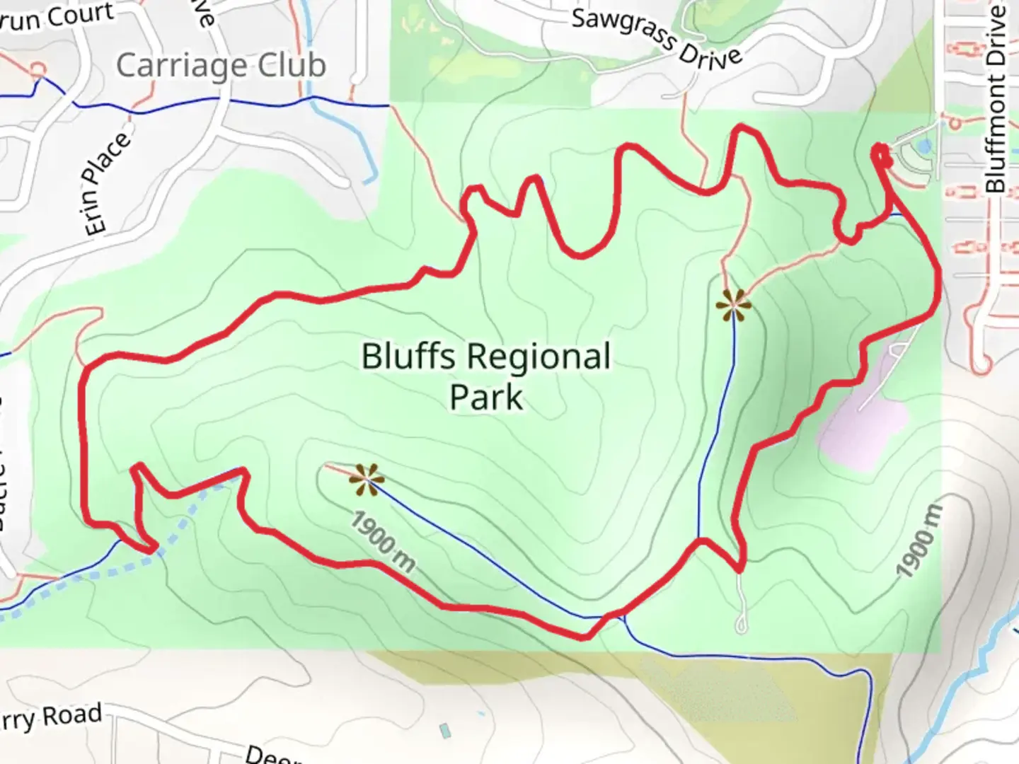 An image depicting the trail Bluffs Regional Park Loop Trail and its surrounding area.