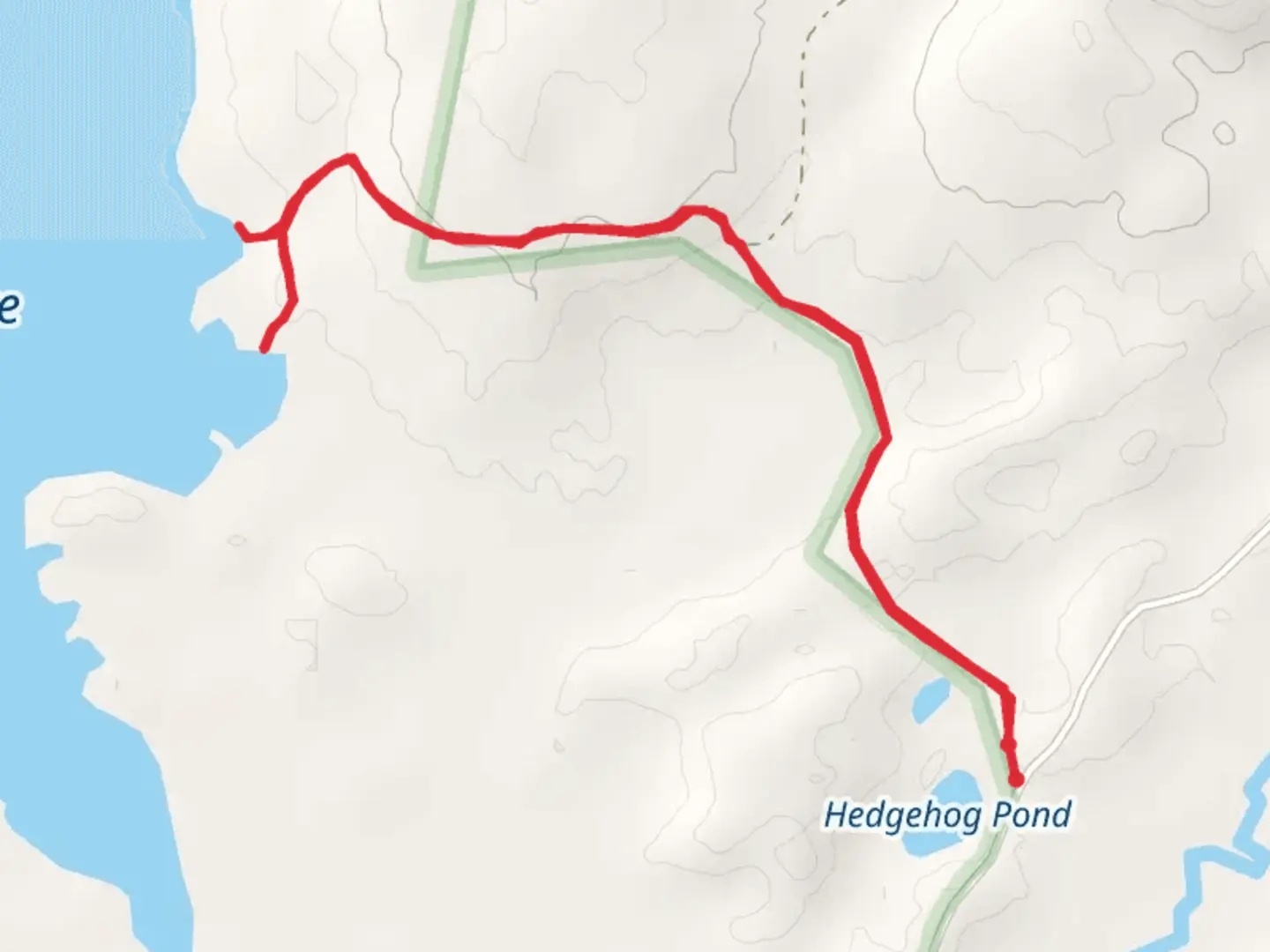An image depicting the trail Round Lake from Round Pond Road and its surrounding area.