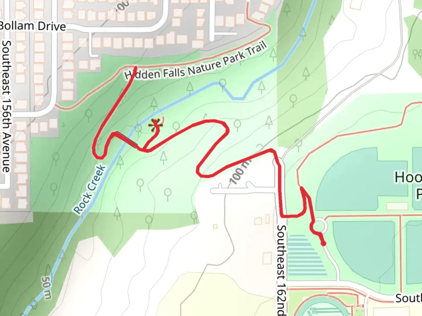 An image depicting the trail Hidden Falls and its surrounding area.
