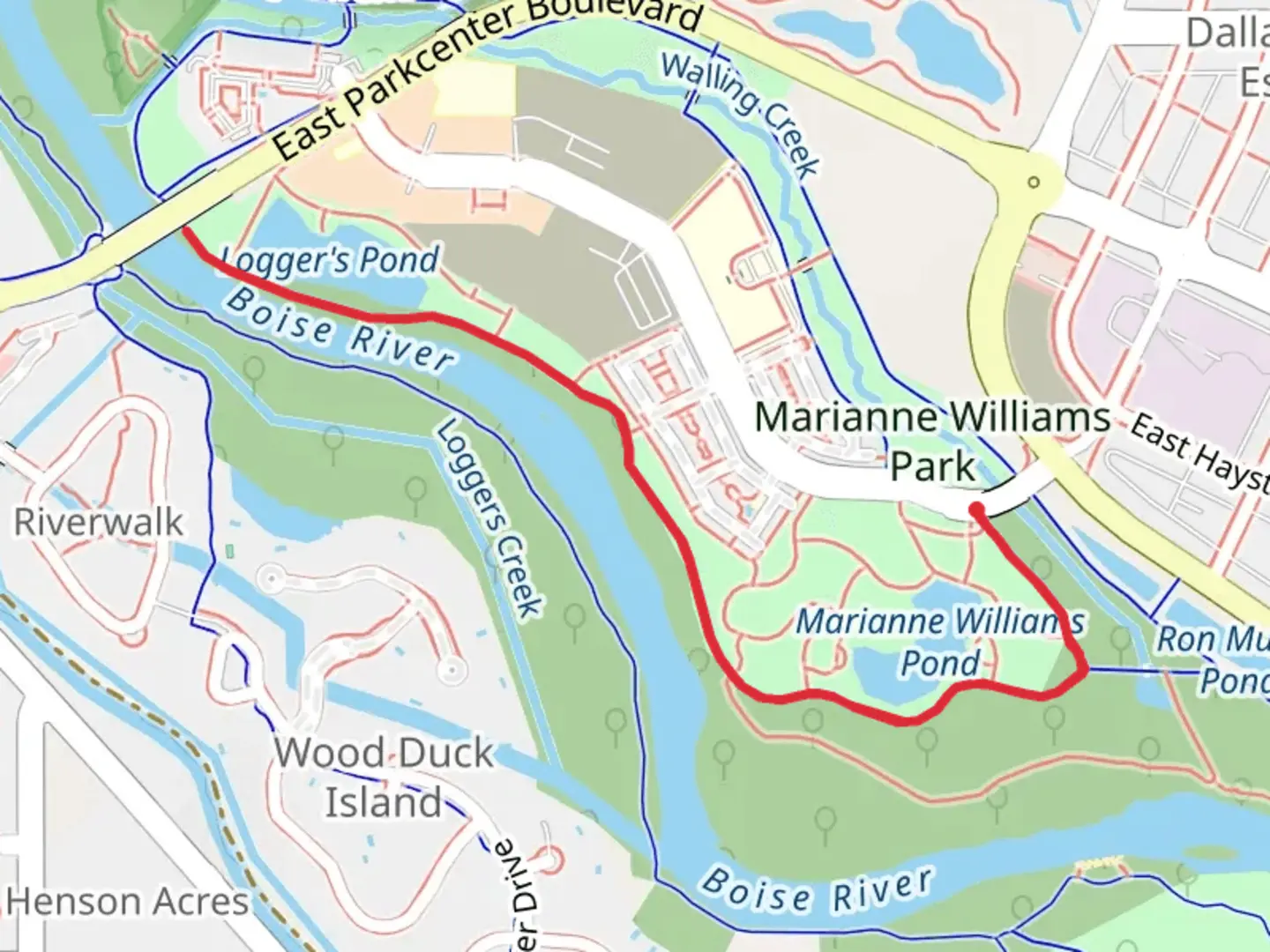 An image depicting the trail Boise Greenbelt from Marianne Williams Park and its surrounding area.
