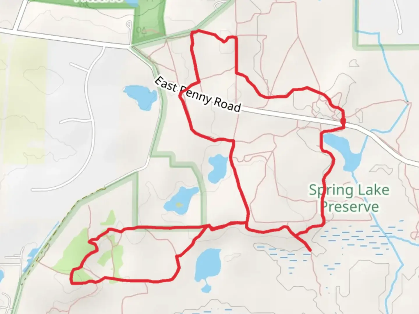 An image depicting the trail Loop around Penny Road Pond - County Forest Preserve and its surrounding area.