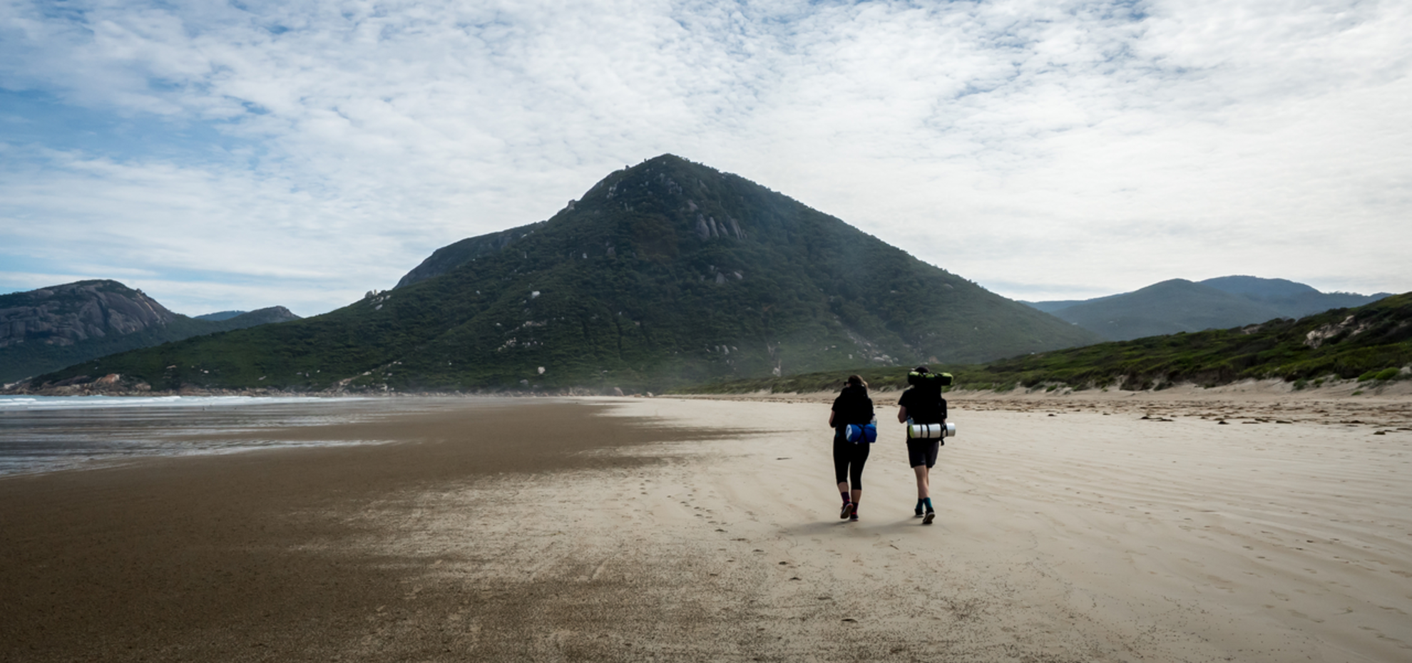 An image depicting the trail Tidal River to Refuge Cove Hike and its surrounding area.