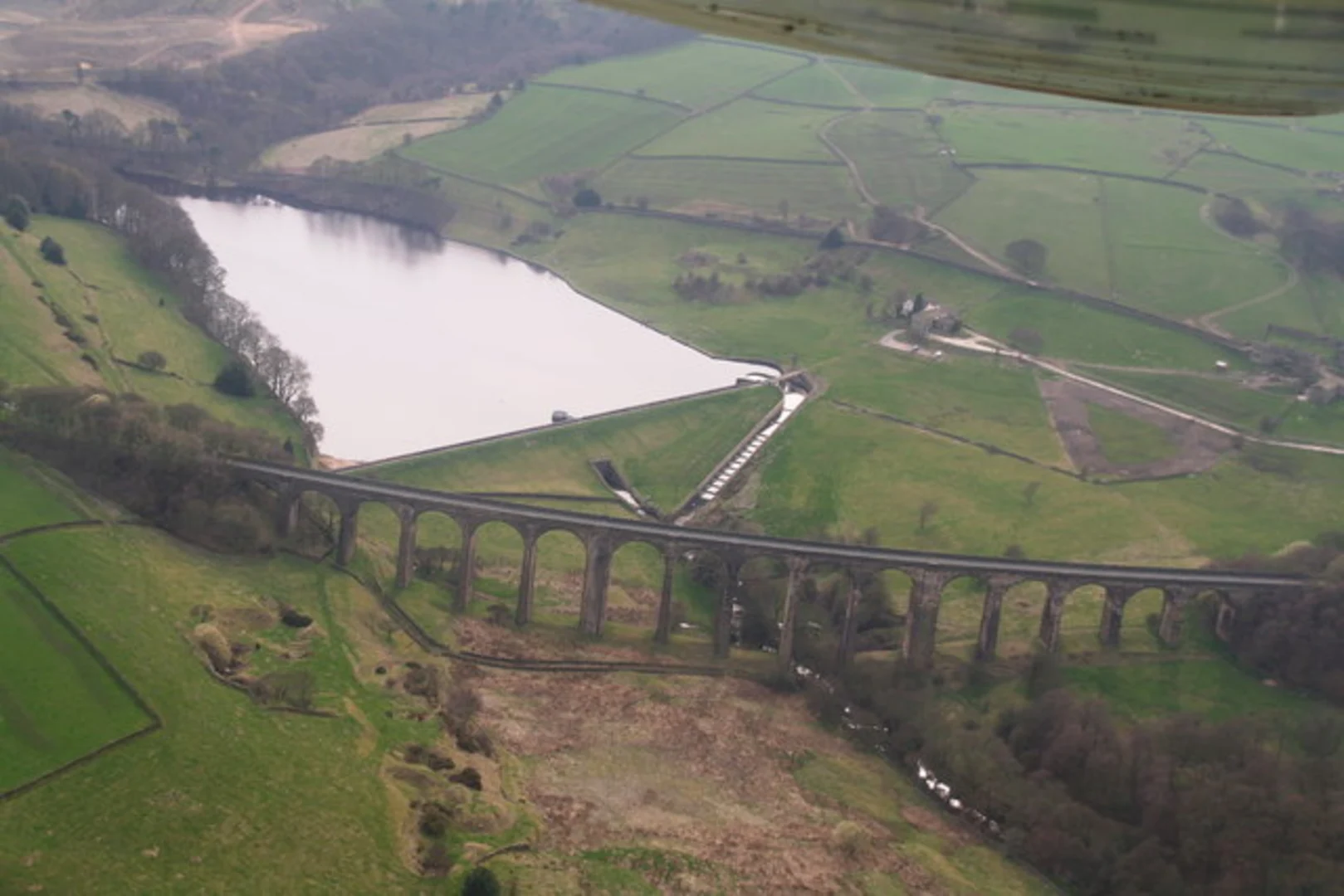 An image depicting the trail Crag Wood and Hewenden Reservoir Loop and its surrounding area.