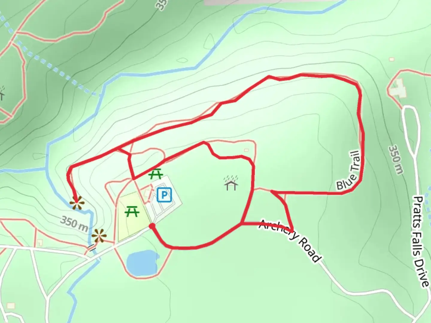 An image depicting the trail Blue Trail Loop from Pratts Falls Drive and its surrounding area.