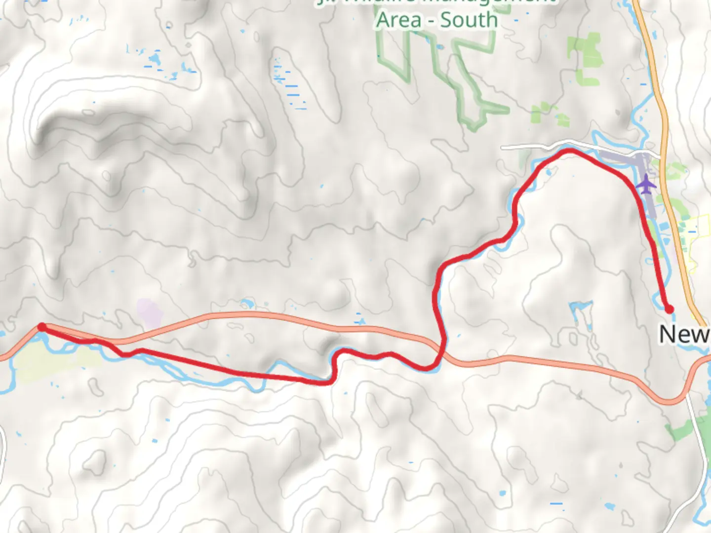 An image depicting the trail Sugar River Trail and its surrounding area.