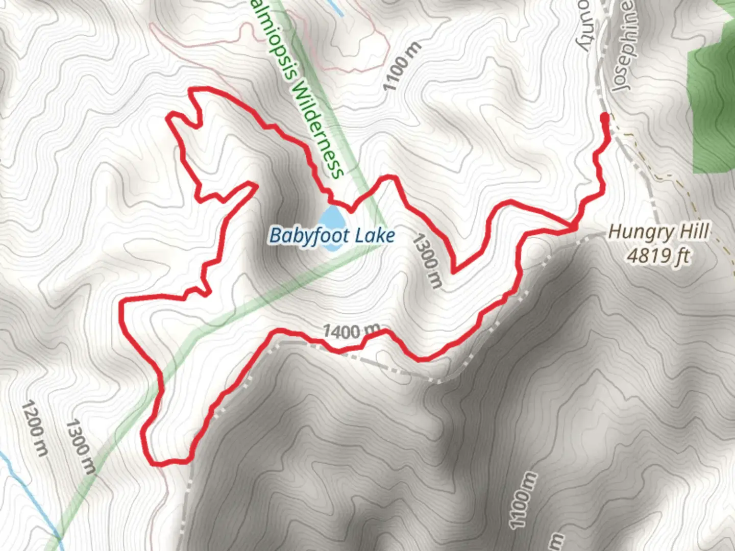 An image depicting the trail Babyfoot Lake Rim Trail and its surrounding area.