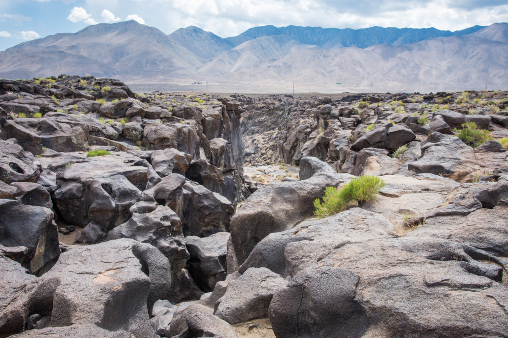 An image depicting the trail Fossil Falls Trail and its surrounding area.