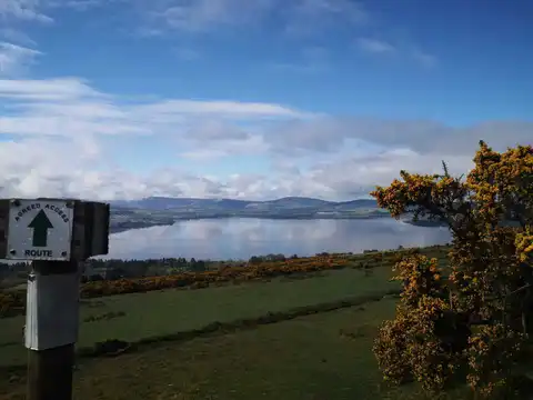 An image depicting the trail Blackmore Hill via Mass path from Lacken and its surrounding area.