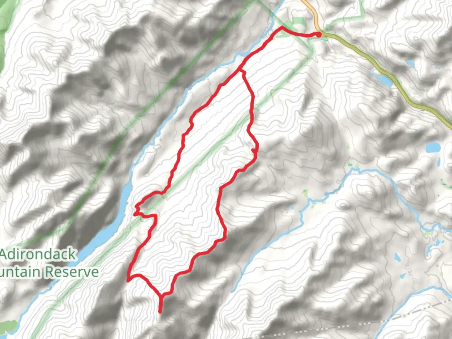 An image depicting the trail Indian Head - Bear Den Mountain Loop and its surrounding area.