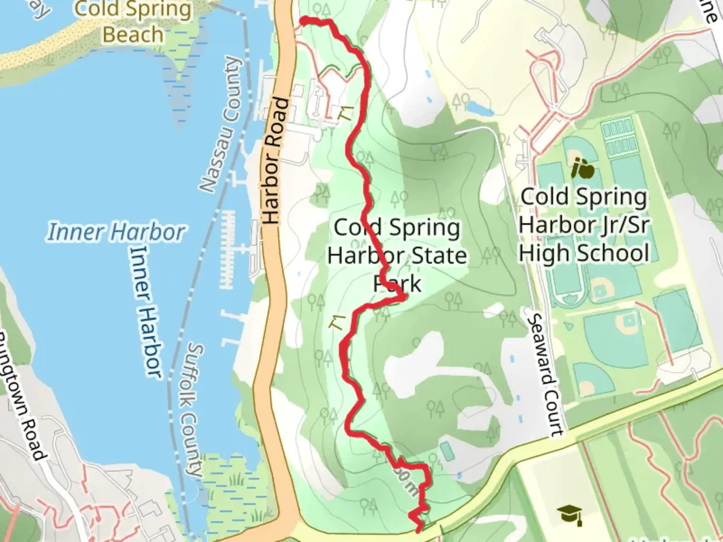 An image depicting the trail Cold Spring Harbor State Park and its surrounding area.