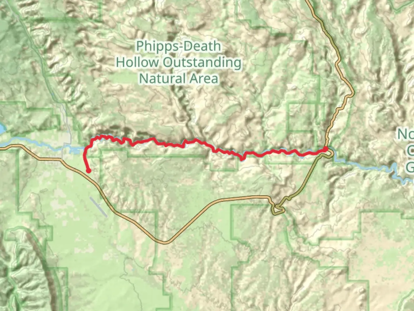 An image depicting the trail Escalante River Trail and Escalante Nature Bridge Trail and its surrounding area.