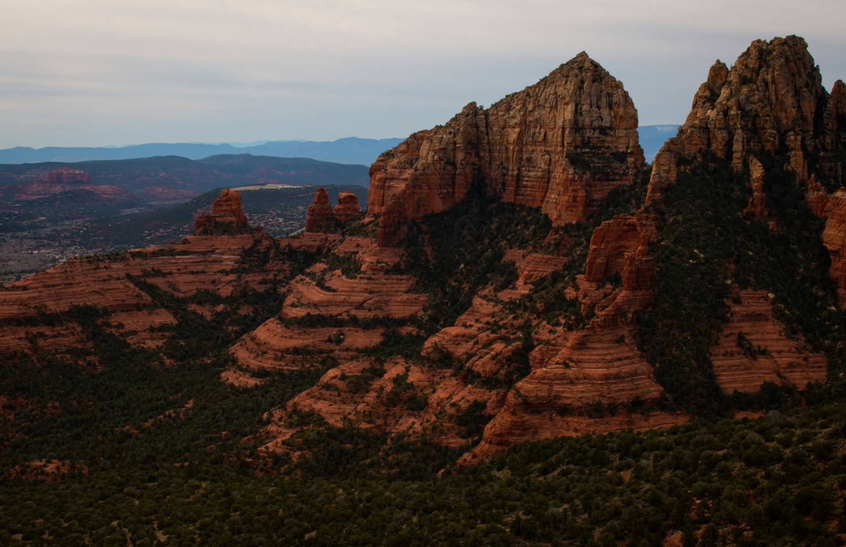 An image depicting the trail First Bench of Wilson Mountain and its surrounding area.