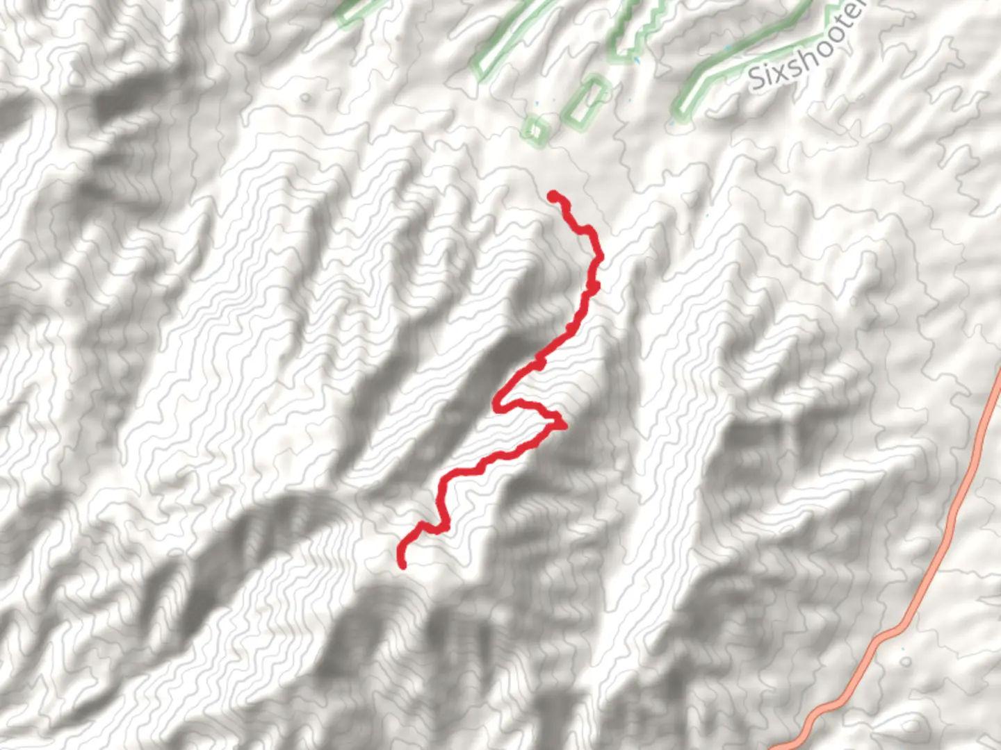 An image depicting the trail Sixshooter Canyon Trail and its surrounding area.