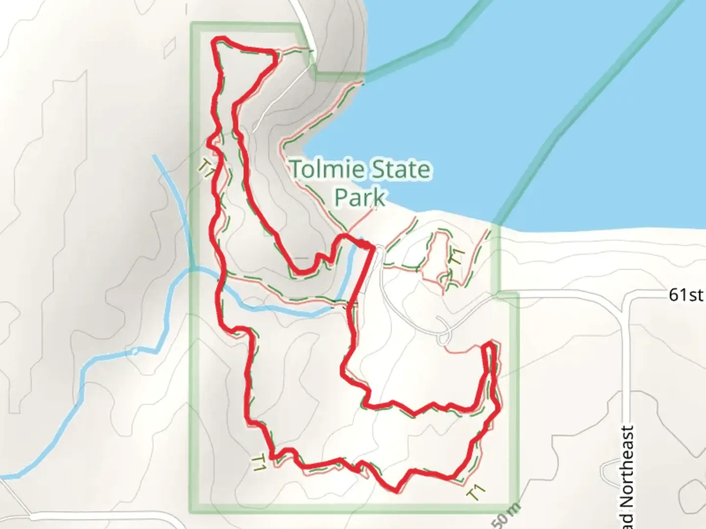 An image depicting the trail Outer and Four Cedars Loop Trail and its surrounding area.