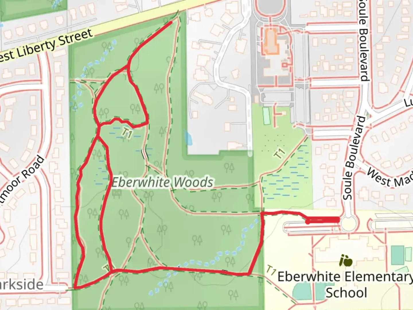 An image depicting the trail Eberwhite Woods Loop Trail and its surrounding area.