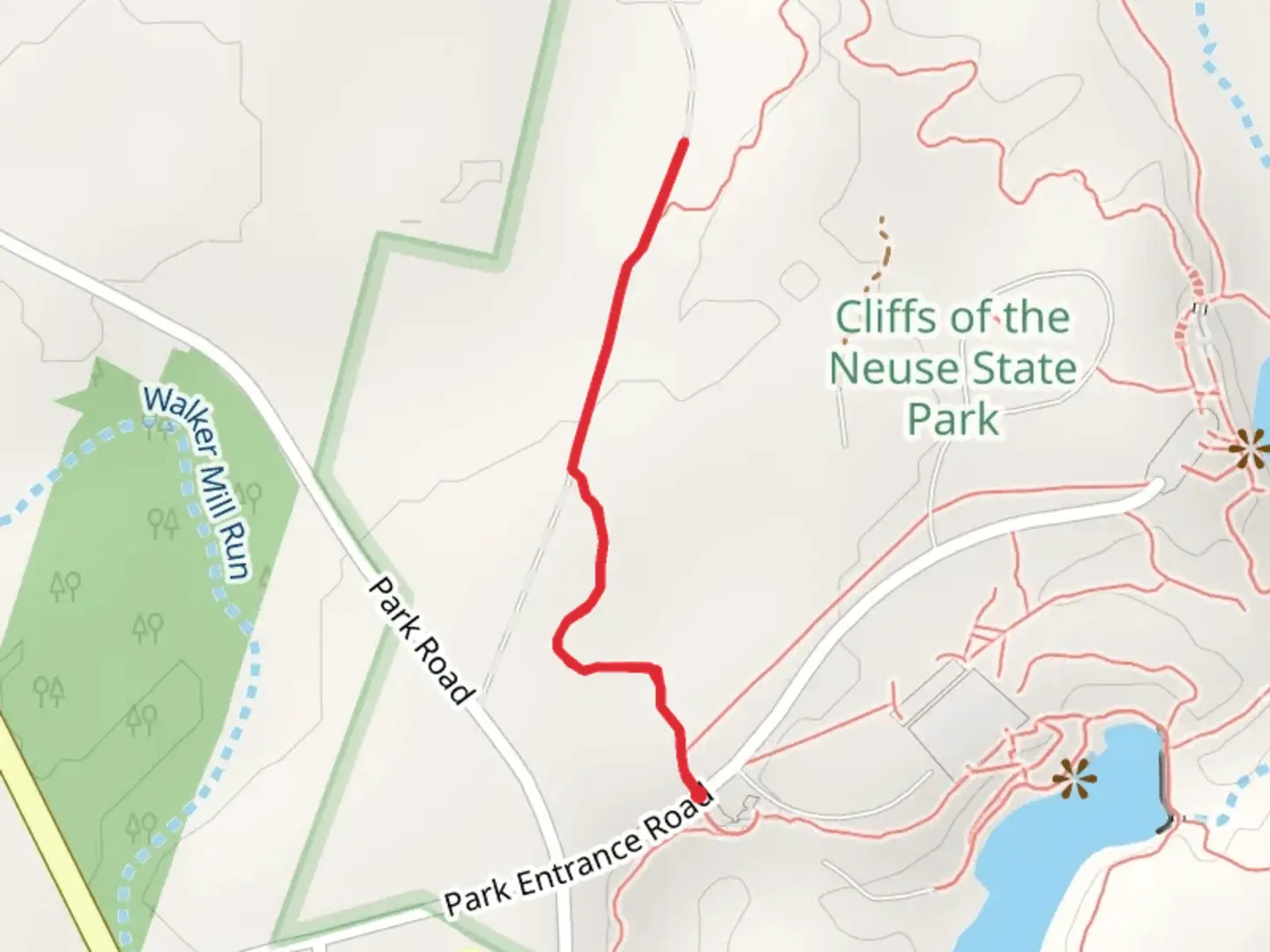 An image depicting the trail North of Cliffs of the Neuse State Park and its surrounding area.