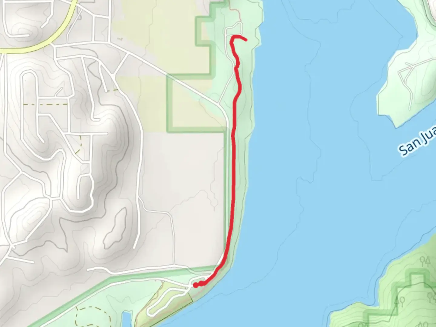 An image depicting the trail Windsurf Beach Trail and its surrounding area.