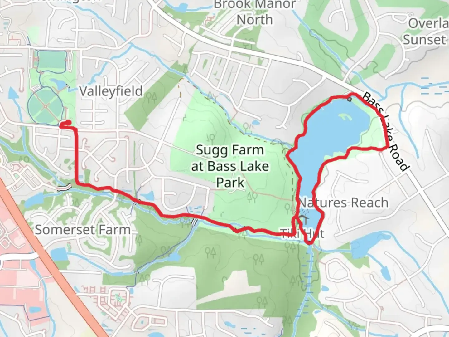 An image depicting the trail Bass Lake Outfall Greenway and Bass Lake Loop and its surrounding area.