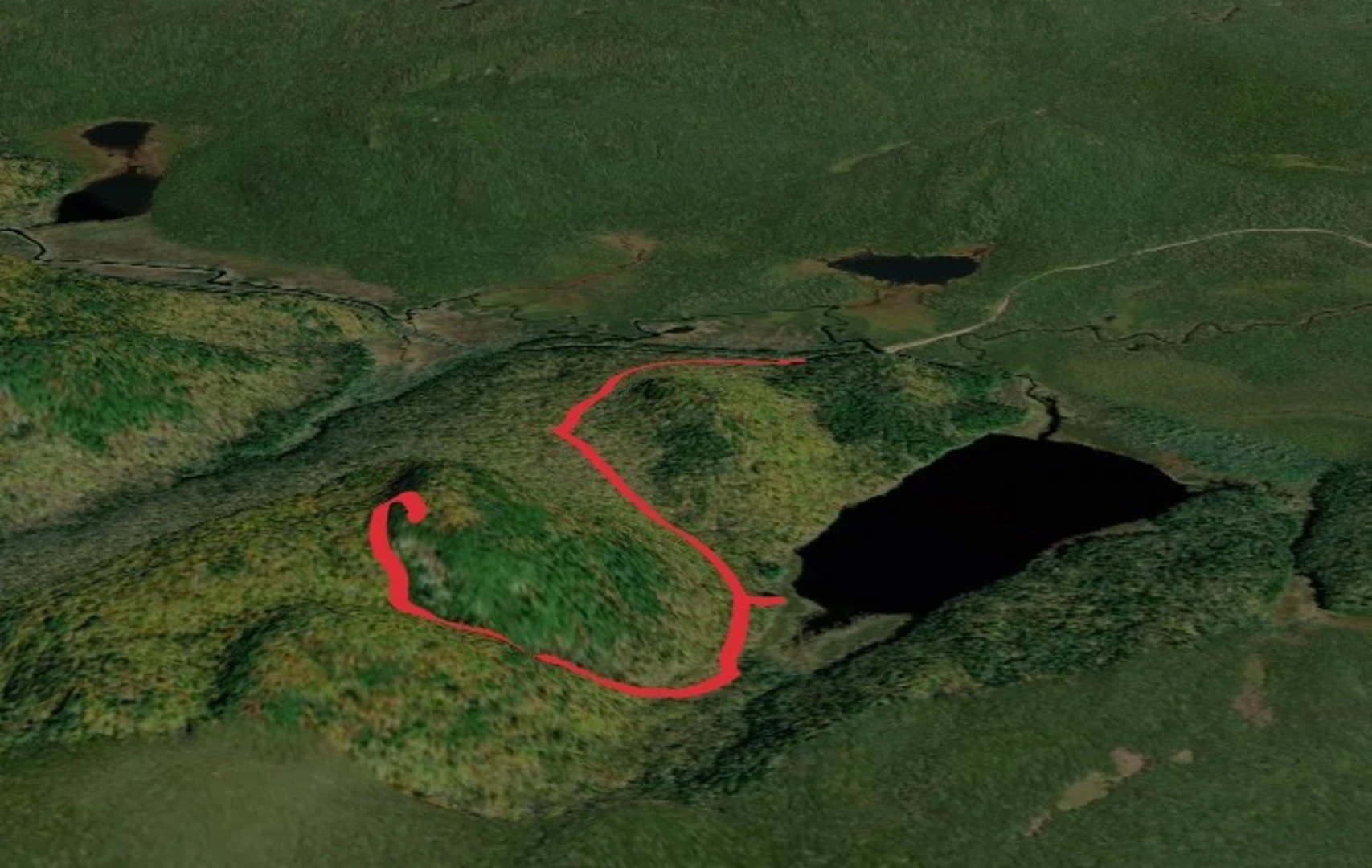 An image depicting the trail Good Luck Lake and Good Luck Mountain and its surrounding area.