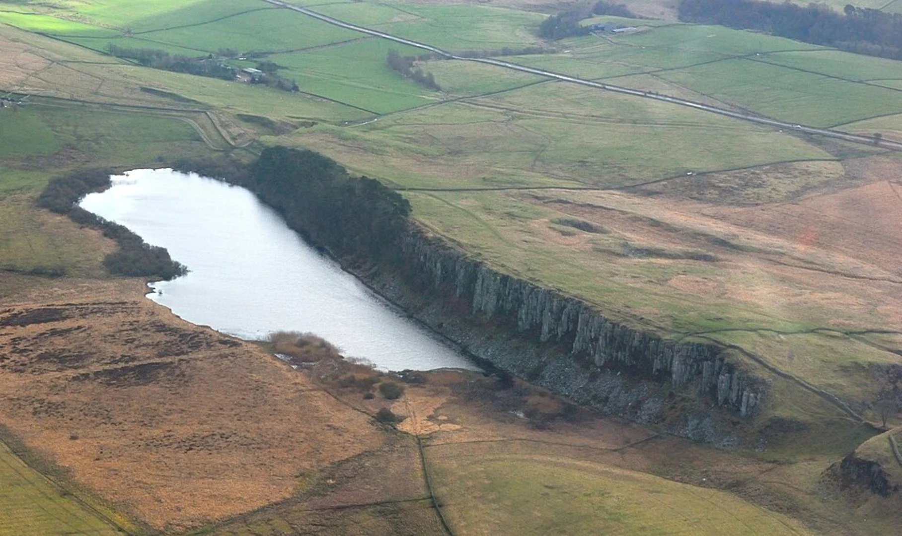 An image depicting the trail Crag Lough and Milecastle via H W Path and its surrounding area.