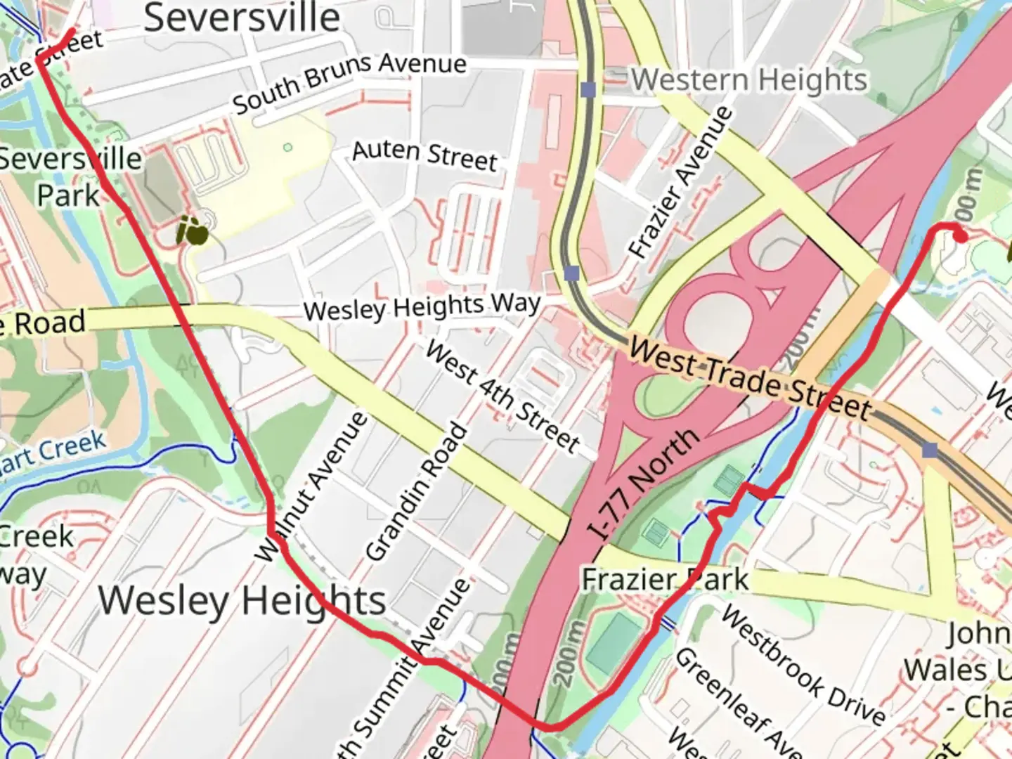 An image depicting the trail Irwin Creek Greenway and Wesley Heights Greenway and its surrounding area.