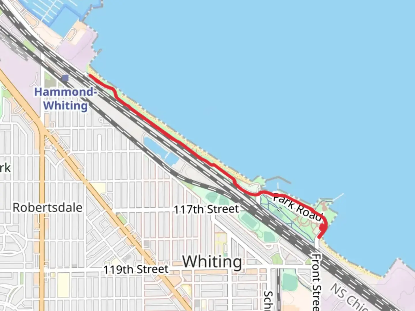 An image depicting the trail Whihala Beach Trail - Whiting Lakefront Park and its surrounding area.