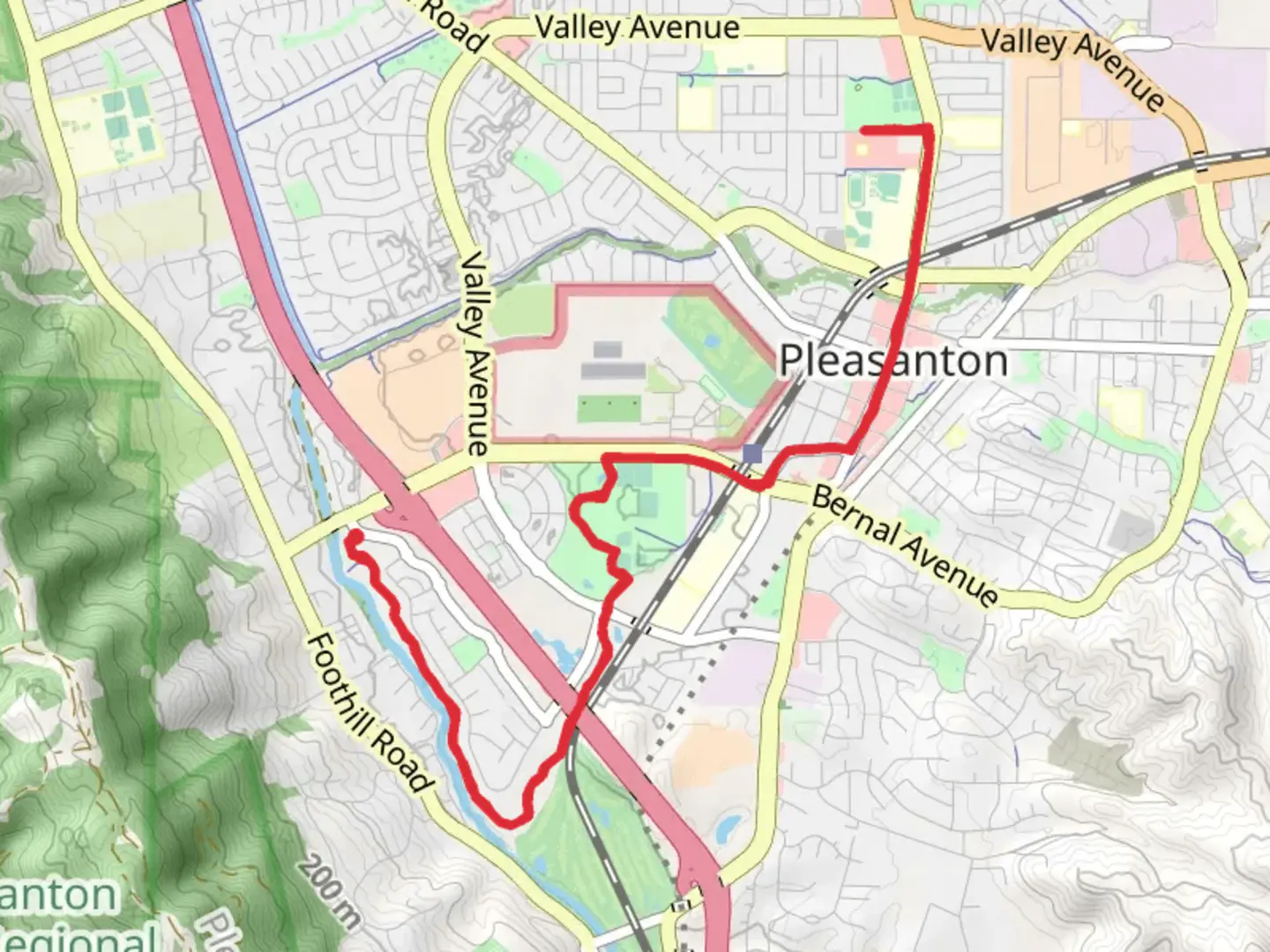 An image depicting the trail Arroyo de la Laguna and Berral community Park and Amador Valley Community Park and its surrounding area.